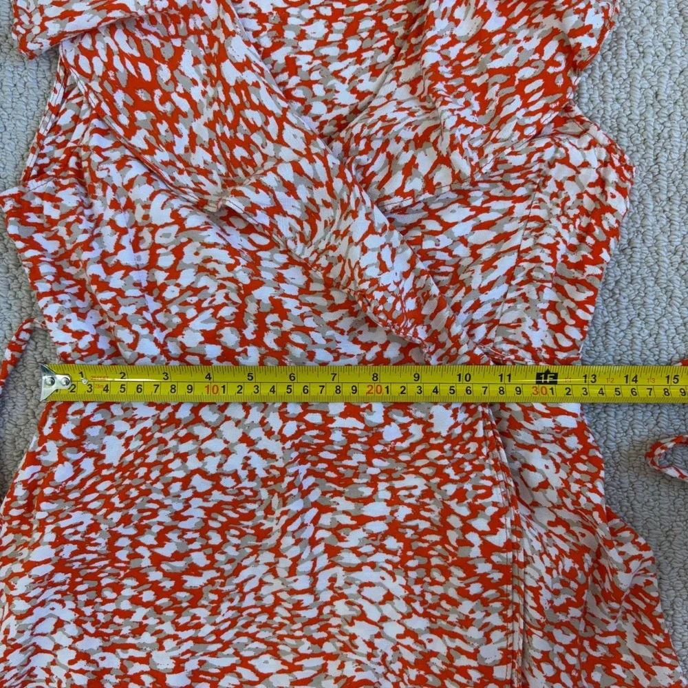 Free People French Quarter mini wrap dress, Small Orange White Animal Print boho